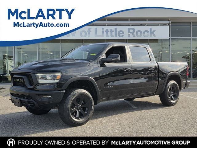 2024 RAM 1500 Rebel in Diamond Black Crystal Pearlcoat — front three-quarter view