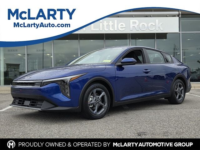 2025 Kia K4 LXS in Deep Sea Blue — front three-quarter view