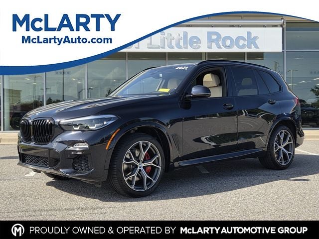 2021 BMW X5 xDrive40i in Carbon Black Metallic — front three-quarter view