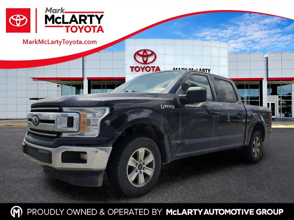 2018 Ford F-150 XLT in Shadow Black — front three-quarter view