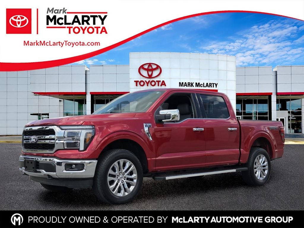 2025 Ford F-150 Lariat in Rapid Red Metallic Tinted Clearcoat — front three-quarter view