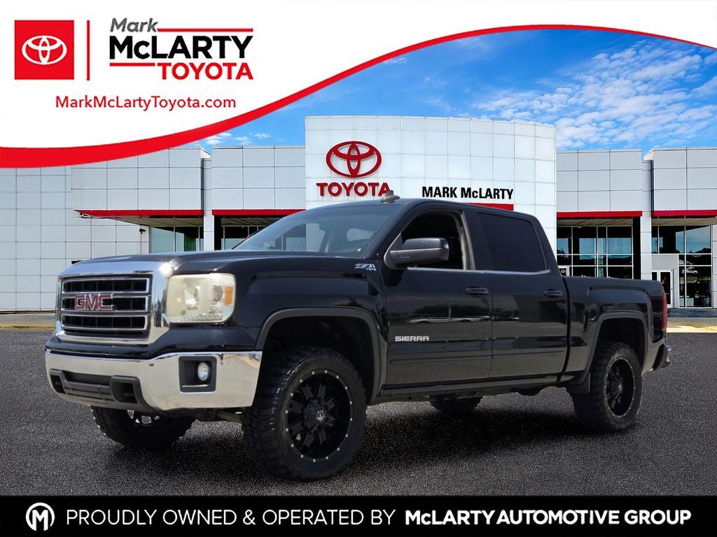 2015 GMC Sierra SLE in Onyx Black — front three-quarter view