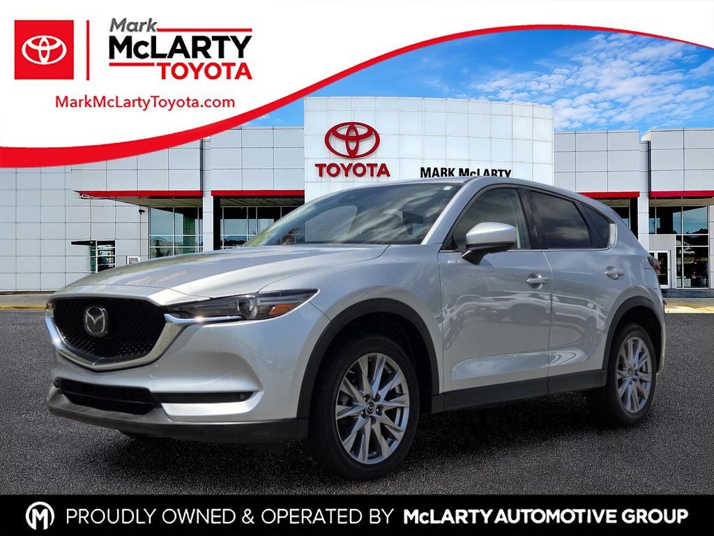 2020 Mazda Mazda CX-5 Grand Touring in Sonic Silver Metallic — front three-quarter view