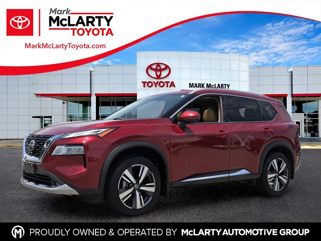 2021 Nissan Rogue Platinum in Scarlet Ember Tintcoat — front three-quarter view
