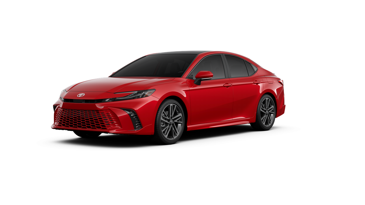 2026 Toyota Camry XSE in Supersonic Red — front three-quarter view