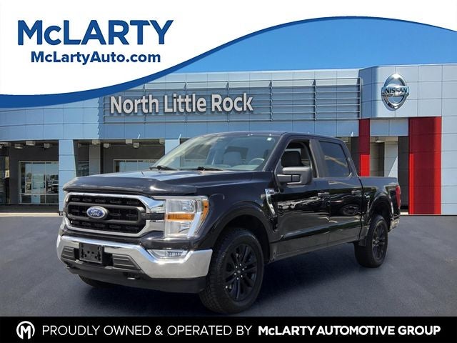 2022 Ford F-150 XLT in Agate Black Metallic — front three-quarter view
