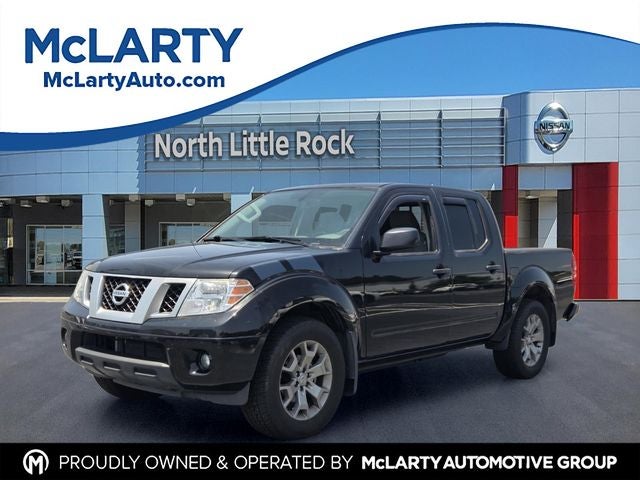2021 Nissan Frontier SV in Magnetic Black Pearl — front three-quarter view