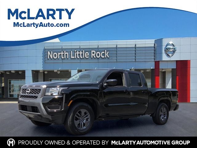 2025 Nissan Frontier SV in Super Black — front three-quarter view