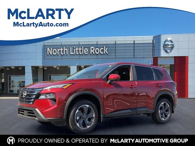2026 Nissan Rogue SV in Scarlet Ember Tintcoat — front three-quarter view