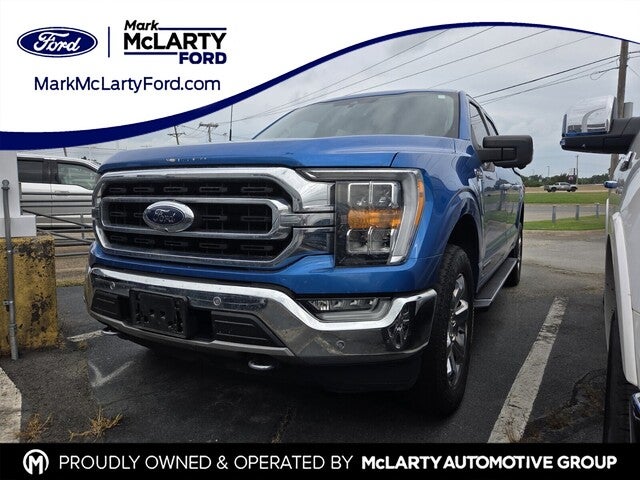 2021 Ford F-150 XLT in Blue Metallic — front three-quarter view