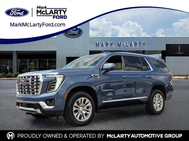 2026 GMC Yukon Denali in Downpour Metallic — front three-quarter view