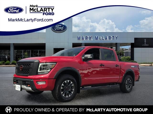 2024 Nissan Titan PRO-4X in Red Alert — front three-quarter view