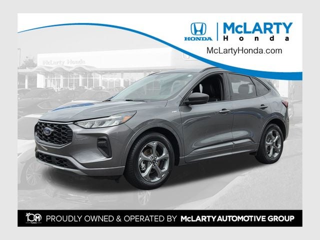 2024 Ford Escape ST-Line in Carbonized Gray Metallic — front three-quarter view