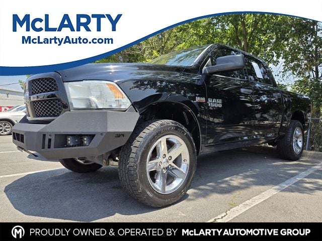 2014 RAM 1500 Express in Black Clearcoat — front three-quarter view
