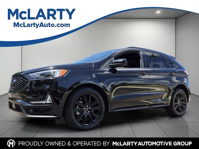 2021 Ford Edge ST Line in Black Metallic — front three-quarter view