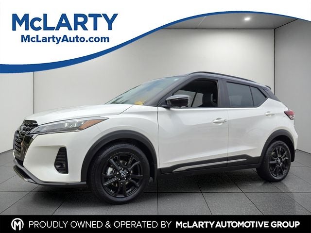 2023 Nissan Kicks SR in Aspen White/Super Black — front three-quarter view