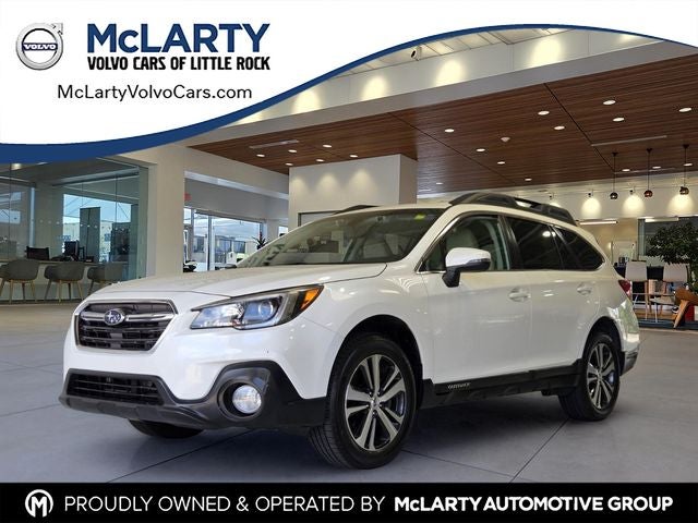 2019 Subaru Outback 2.5i Limited in Crystal White Pearl — front three-quarter view