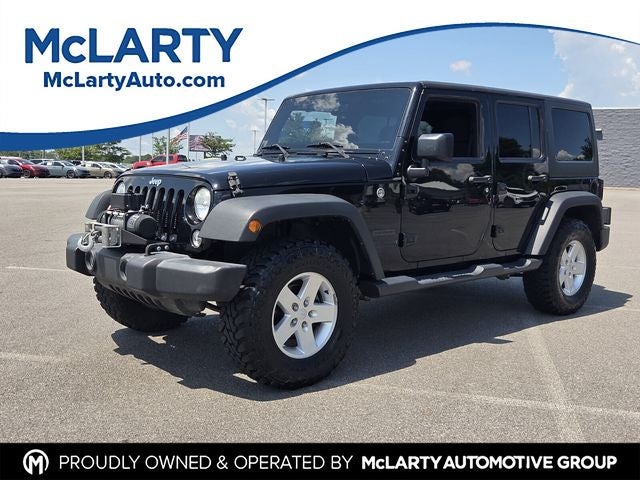 2017 Jeep Wrangler Unlimited Sport in Black Clearcoat — front three-quarter view