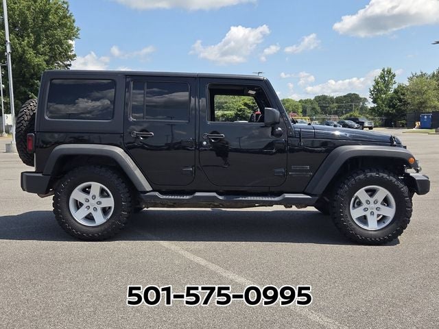 2017 Jeep Wrangler — rear three-quarter view