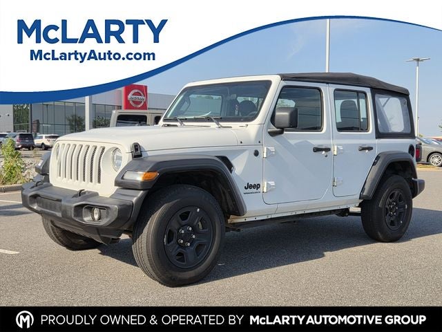 2023 Jeep Wrangler Sport in Bright White Clearcoat — front three-quarter view