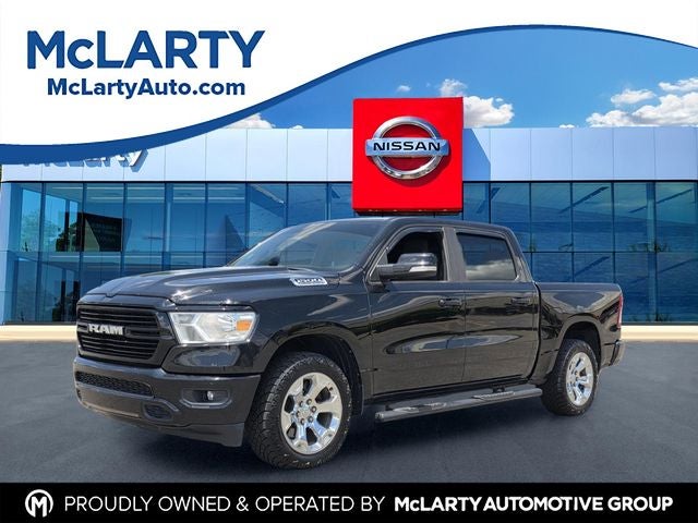 2019 RAM 1500 Big Horn/Lone Star in Diamond Black Crystal Pearlcoat — front three-quarter view