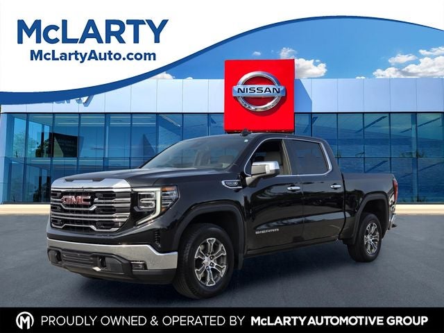 2025 GMC Sierra 1500 SLT in Onyx Black — front three-quarter view