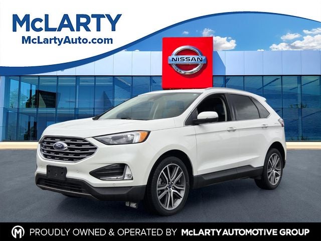 2022 Ford Edge Titanium in White Metallic — front three-quarter view