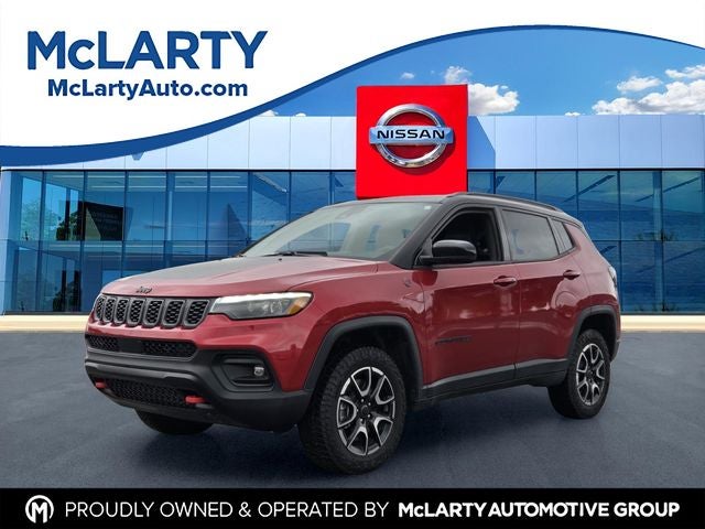 2025 Jeep Compass Trailhawk in Red Hot Pearlcoat — front three-quarter view