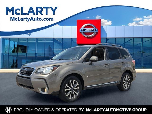 2017 Subaru Forester 2.0XT Touring in Sepia Bronze Metallic — front three-quarter view