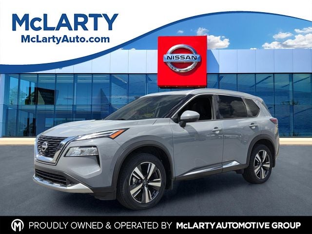 2023 Nissan Rogue Platinum in Boulder Gray Pearl — front three-quarter view