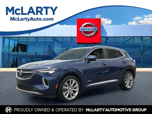 2023 Buick Envision Avenir in Sapphire Metallic — front three-quarter view