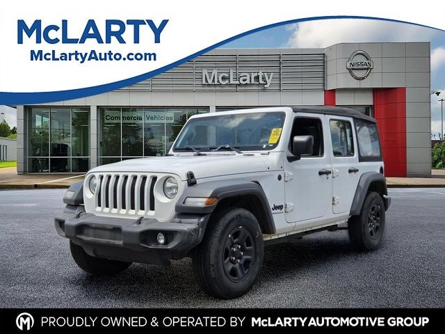 2023 Jeep Wrangler Sport in Bright White Clearcoat — front three-quarter view