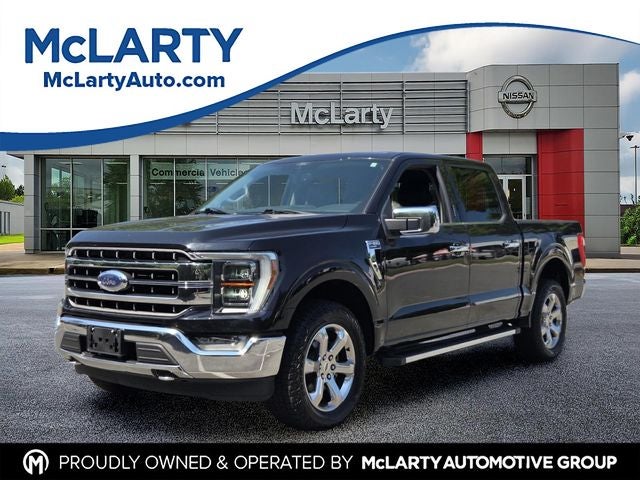 2021 Ford F-150 Lariat in Black Metallic — front three-quarter view