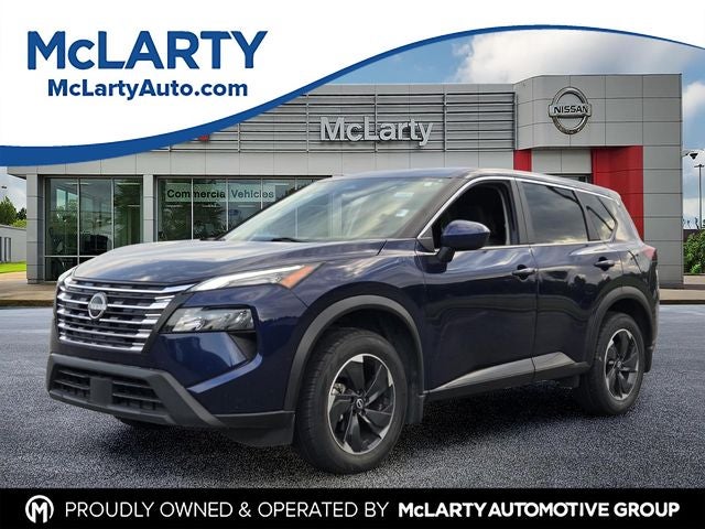 2024 Nissan Rogue SV in Deep Ocean Blue Pearl — front three-quarter view